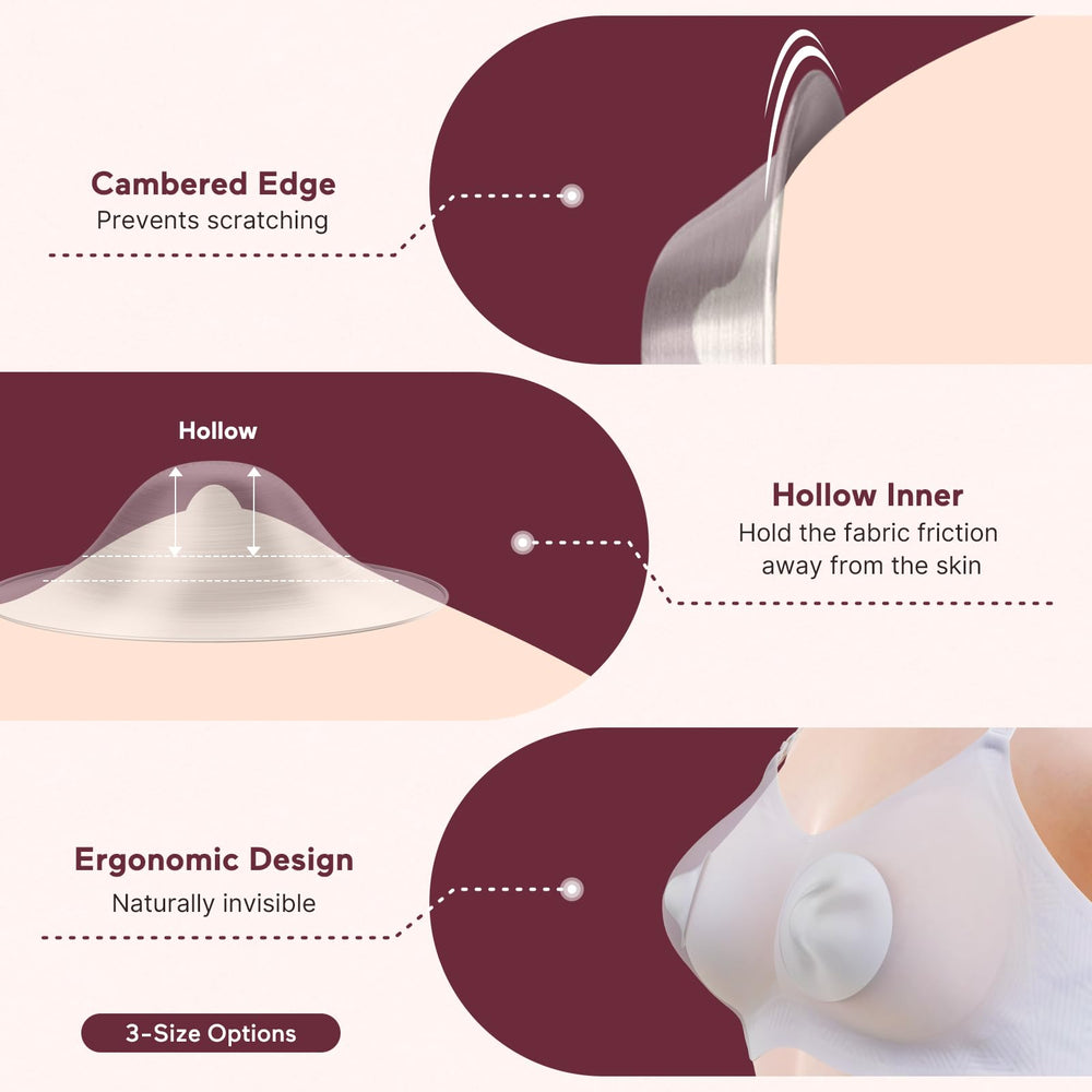 Momcozy silver nipple shields hole-free design for discreet wear during breastfeeding.
