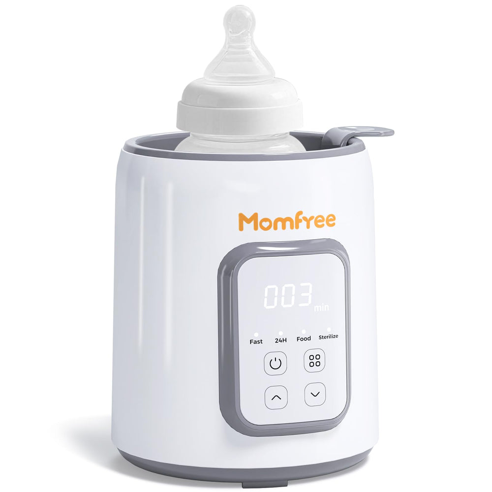 Momfree bottle warmer includes cleaning brush and five breastmilk bags.