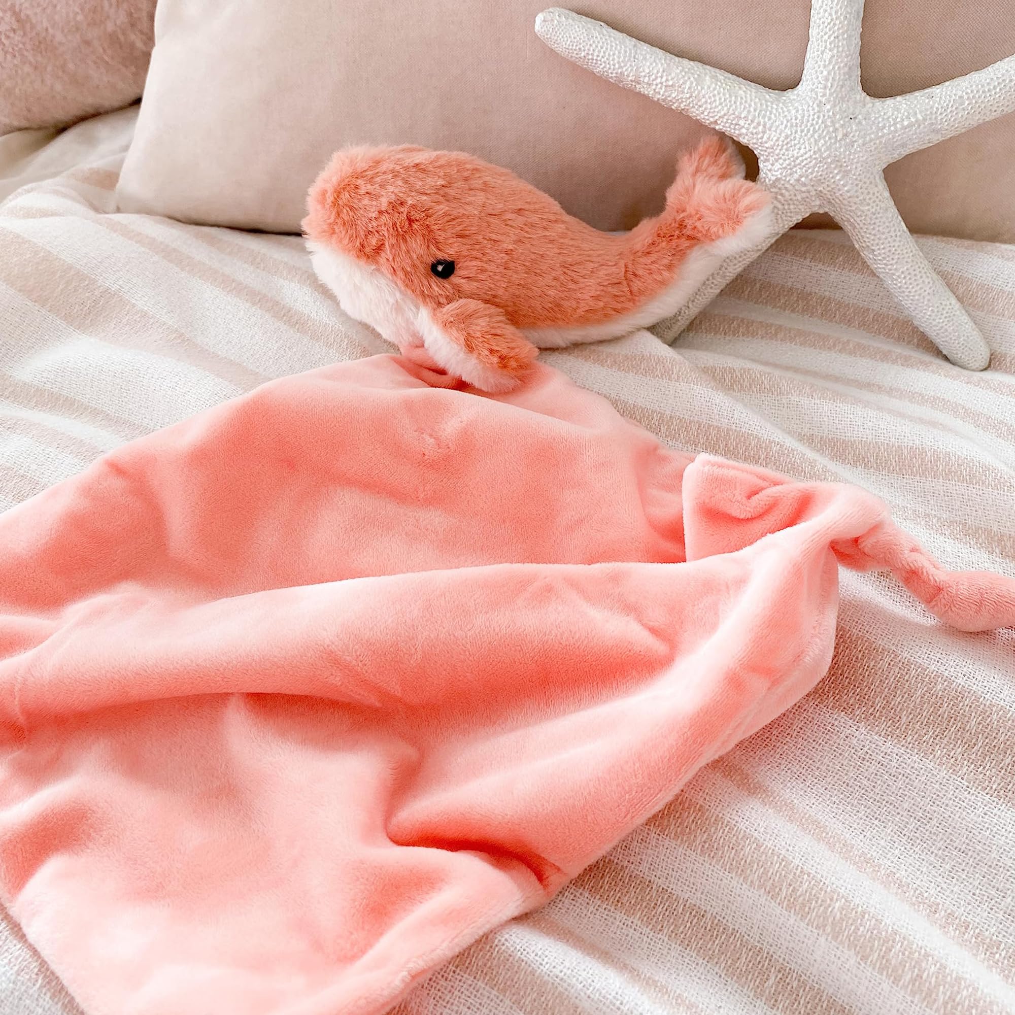 MON AMI Coral Whale Lovey is machine-washable and travel-friendly for busy families.