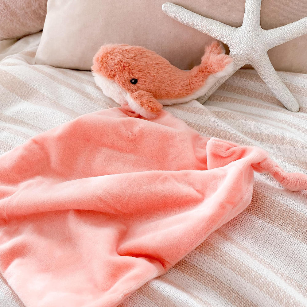 MON AMI Coral Whale Lovey is machine-washable and travel-friendly for busy families.