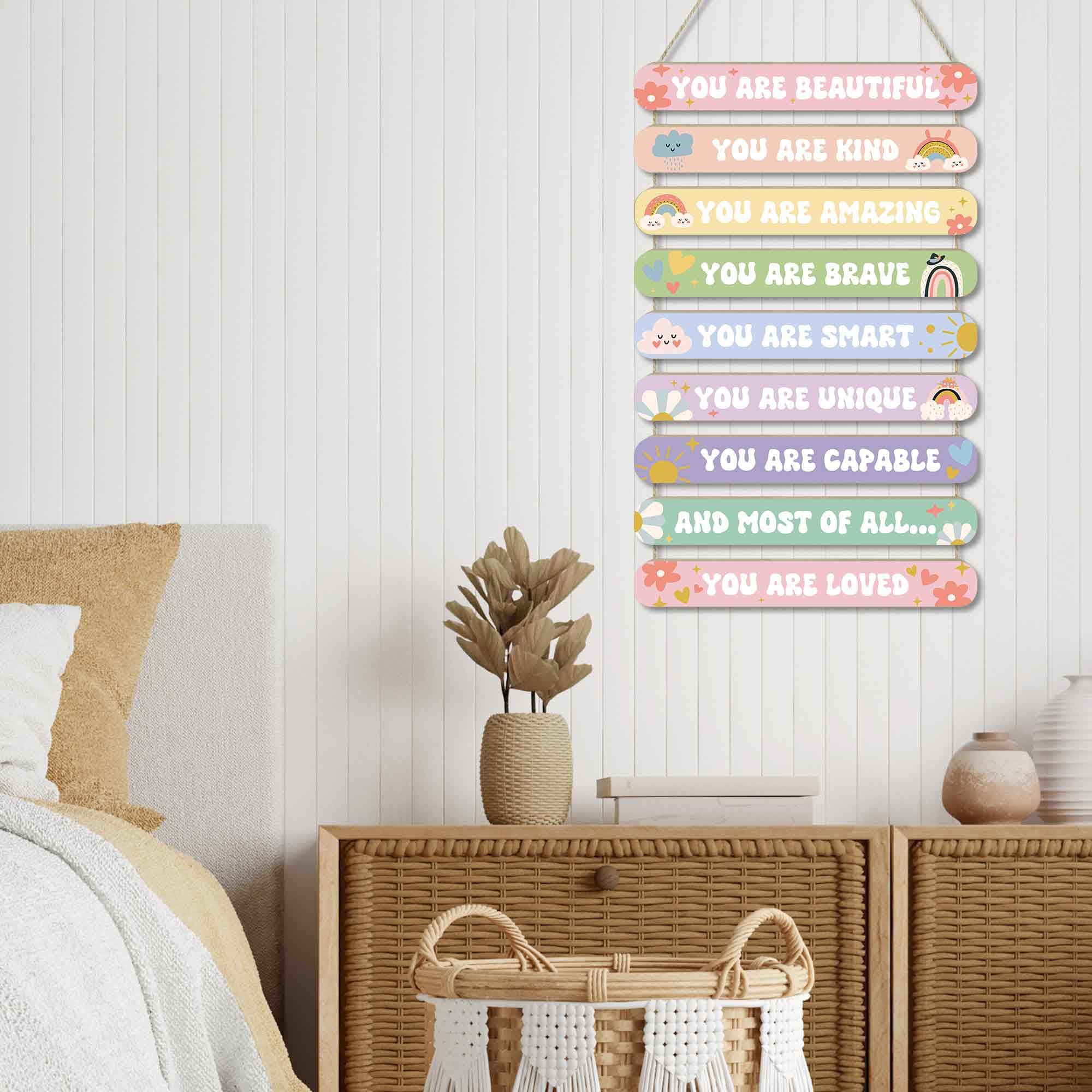 MONALET 9-piece wood sign set brightens nurseries with cheerful pastel quotes.