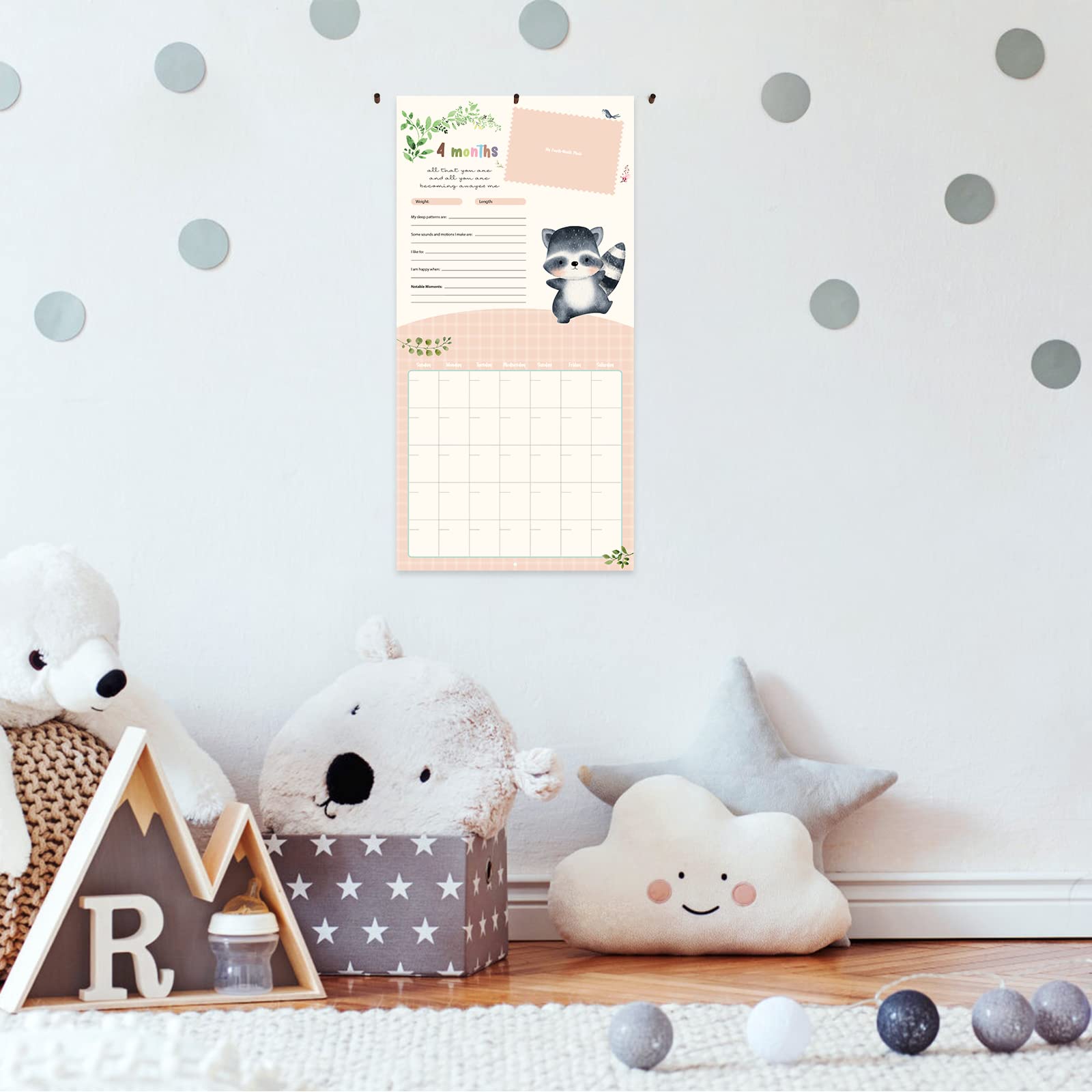 Monking calendar wall display creates a charming, organized nursery focal point.