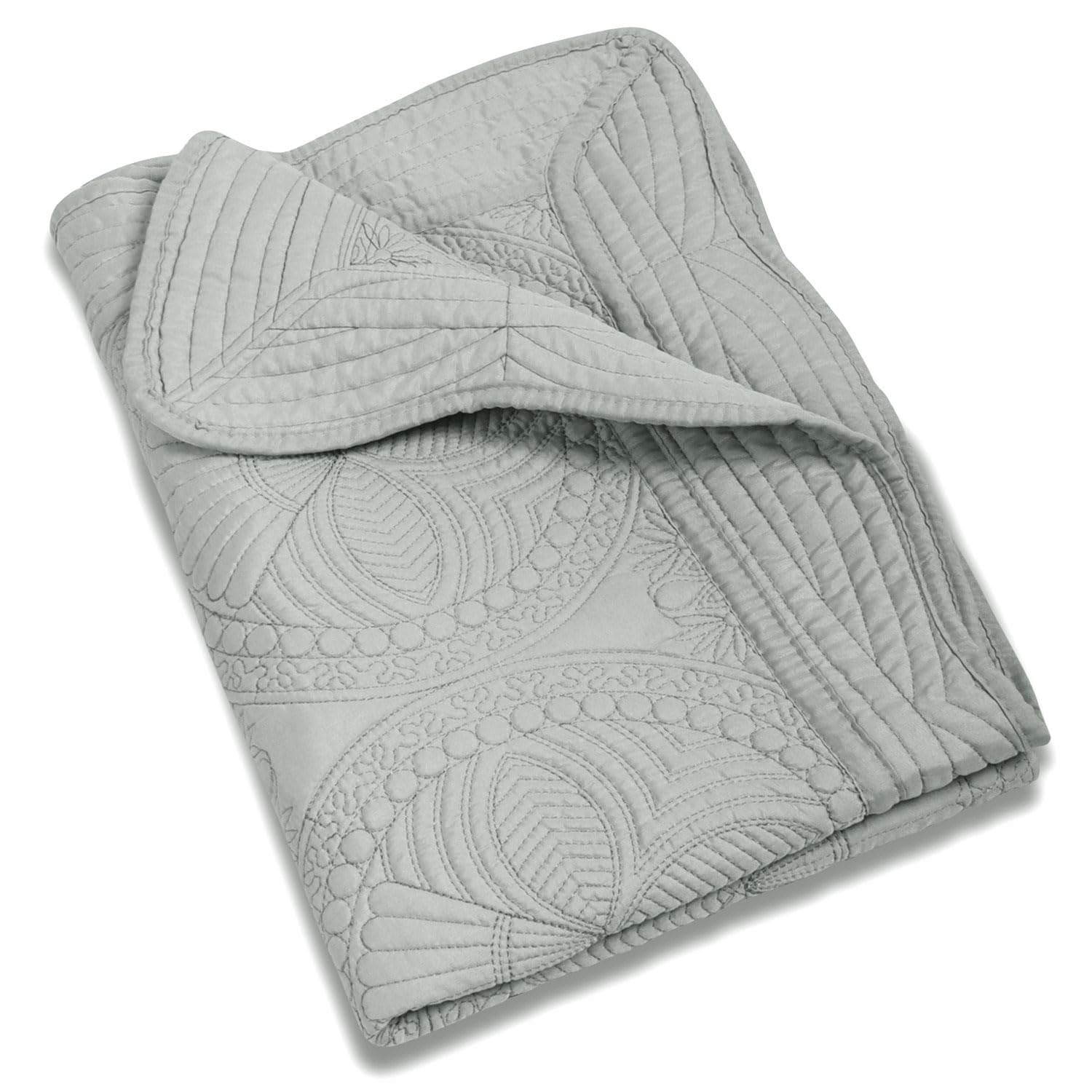 MONOBLANKS baby quilt embossed-scalloped edge adds heirloom charm to a cozy nursery décor.