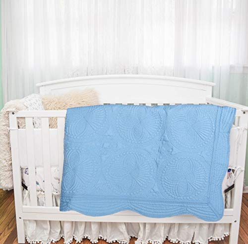 MONOBLANKS nursery décor blue quilt enhances room with calming accent
