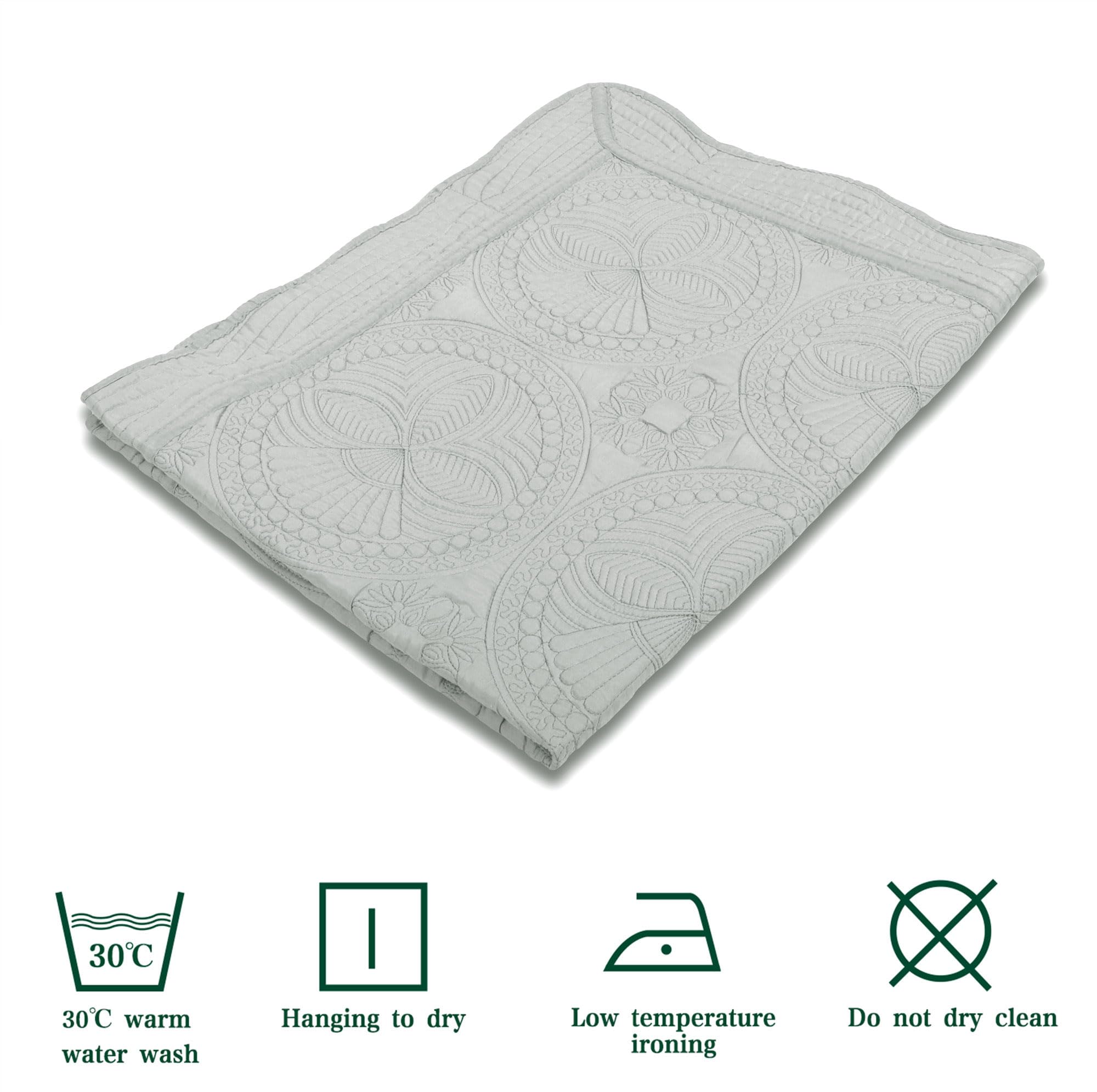 MONOBLANKS baby quilt nursery-decor-gray-trim complements modern crib linens.