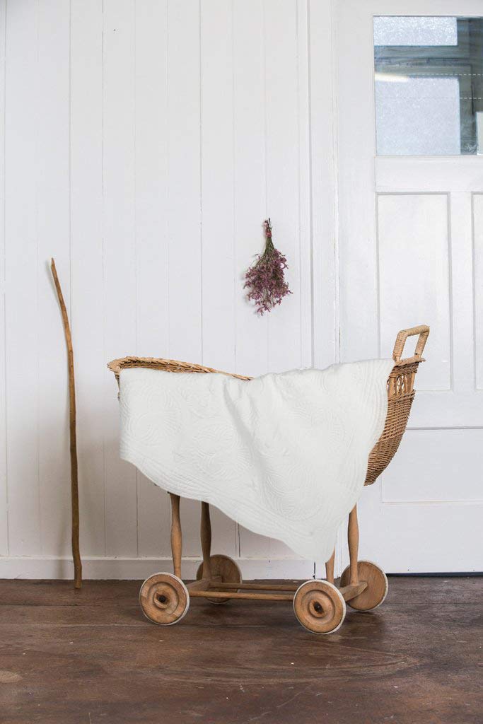 MONOBLANKS baby quilt used as stroller cover for on-the-go comfort