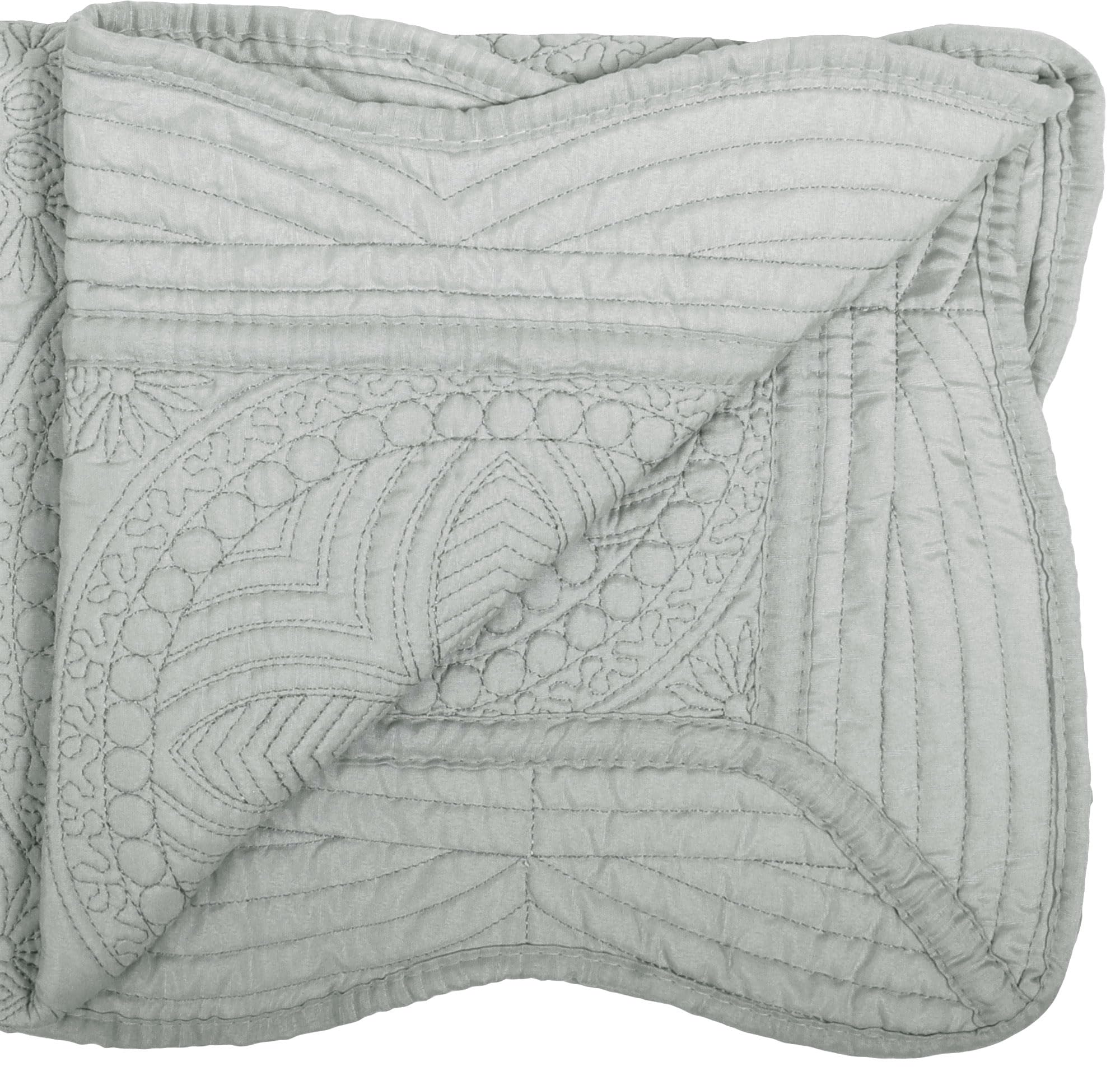 MONOBLANKS baby quilt tummy-time-blanket provides a soft surface for early play.