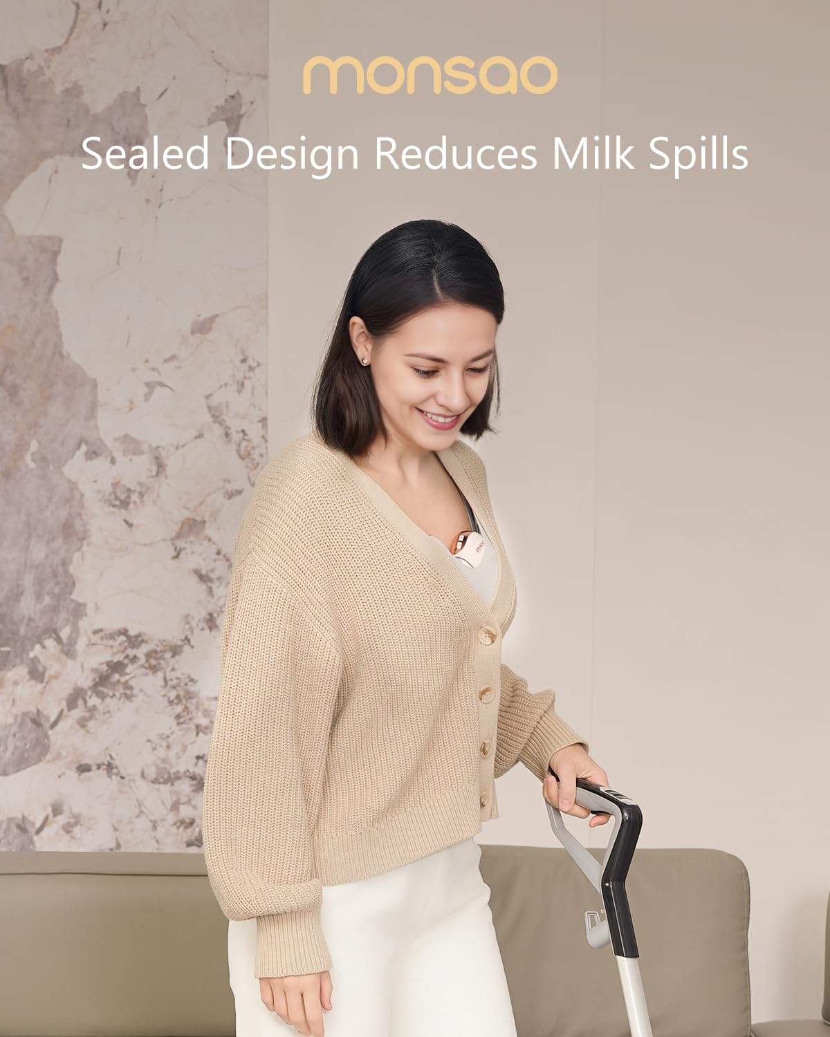 Monsao Wearable Breast Pump in use tucked under clothing for hands-free pumping.