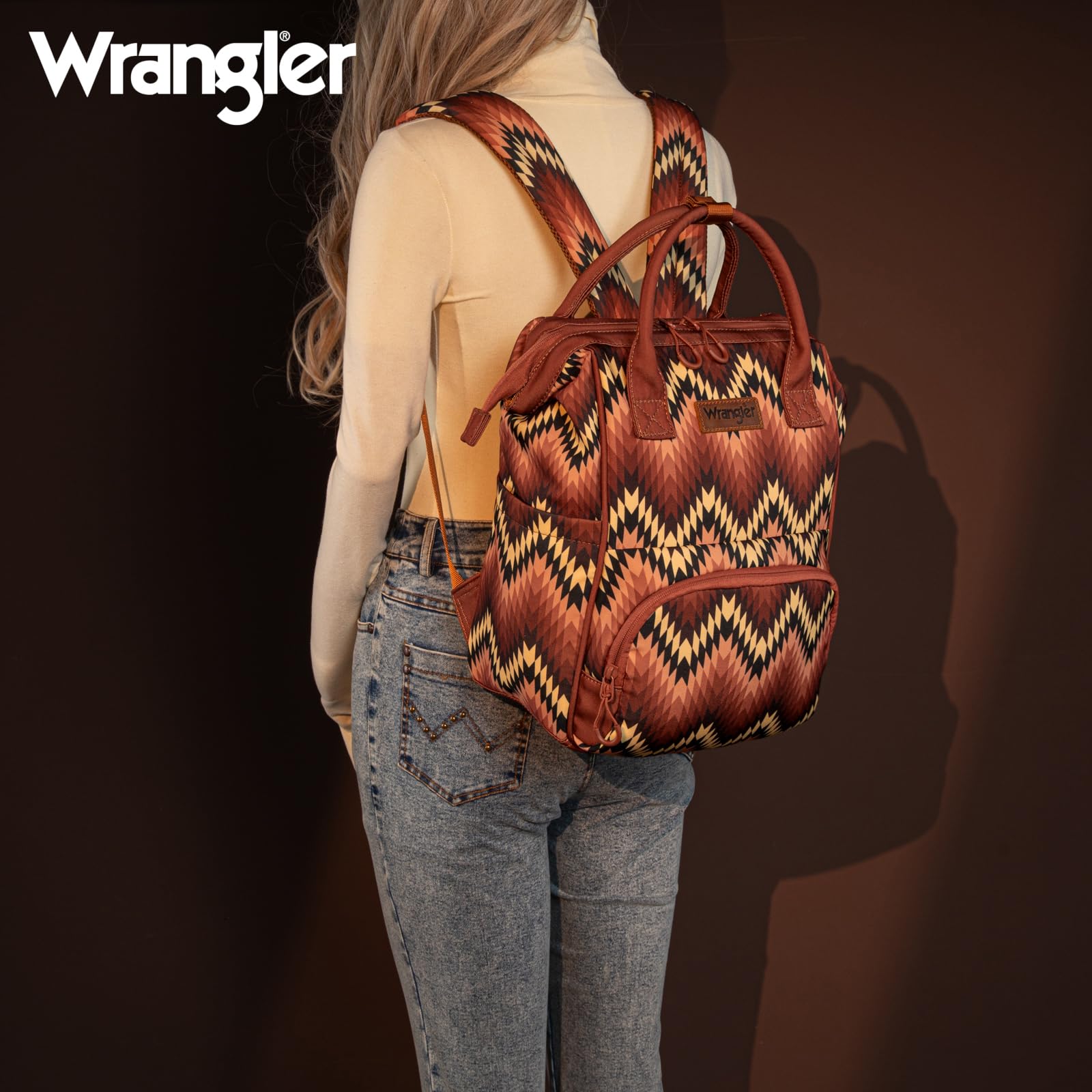 Montana West Wrangler Aztec diaper bag convertible design demonstrates versatile carrying options.