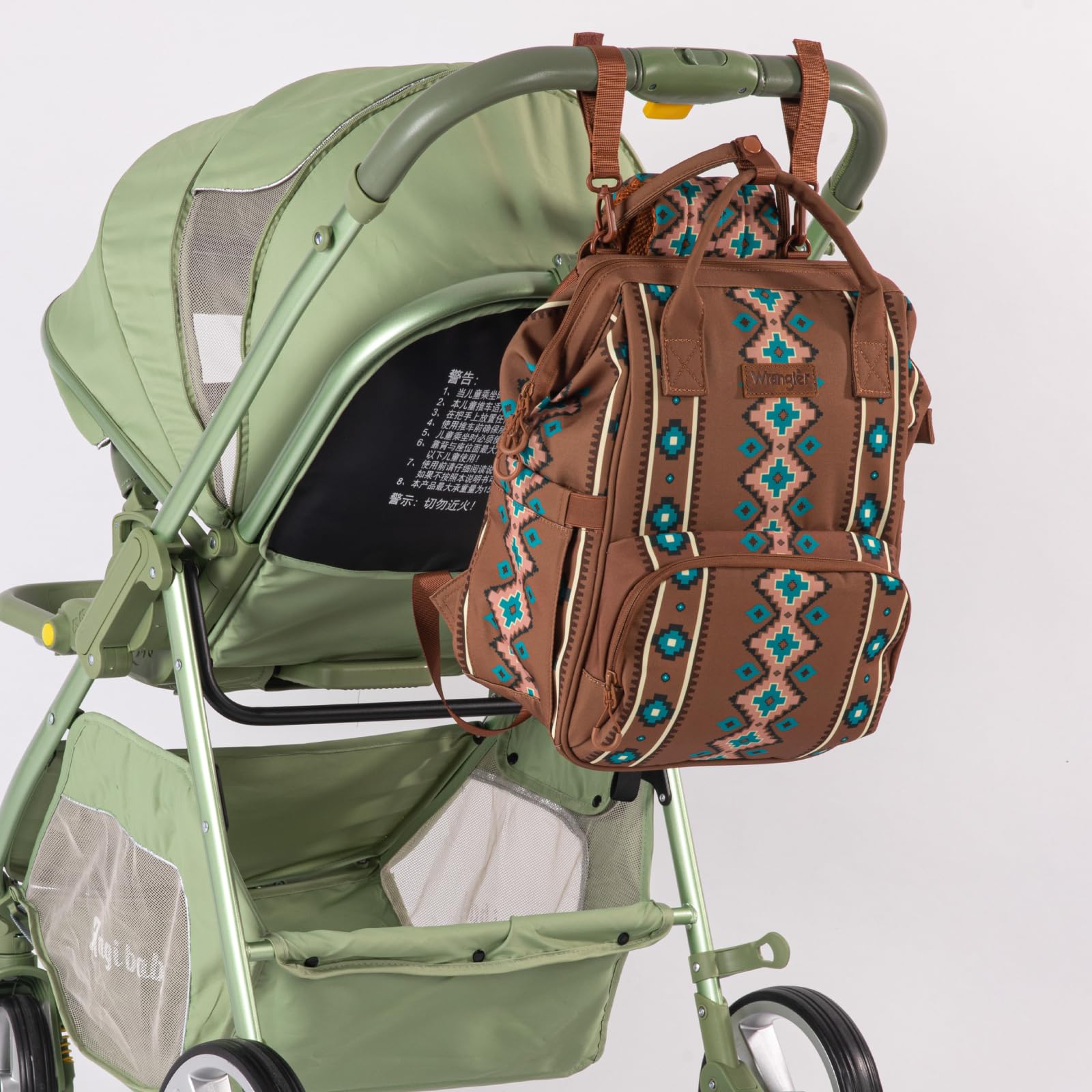 Montana West Wrangler Callie diaper bag adapts as backpack, handbag, or stroller hang.