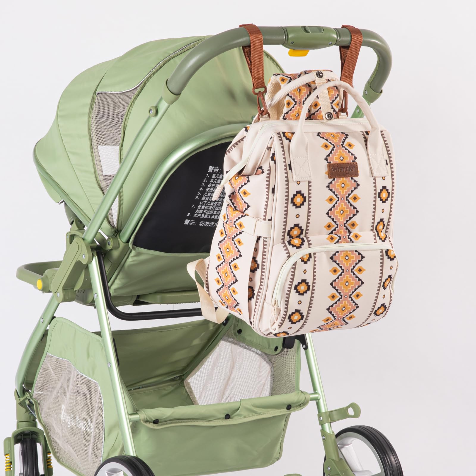 Montana West Wrangler Callie hangs on stroller for easy access during strolls.