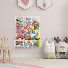 Montex acrylic wall toy dispenser mounted on wall saves space.
