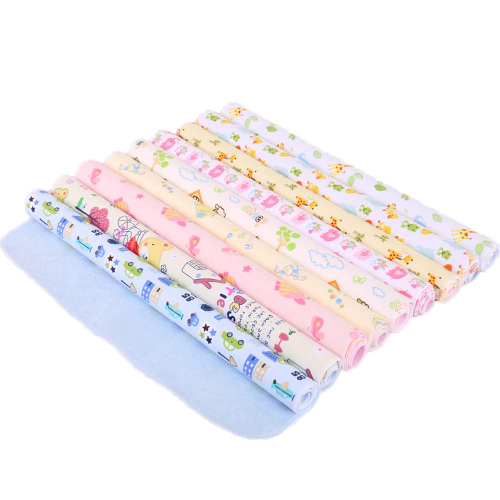 Monvecle changing pad on table use shows reliable protection during diaper care.