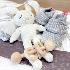 Moody Park baby gift basket booties highlight plush toes and vegan leather soles for warm newborn strolls.