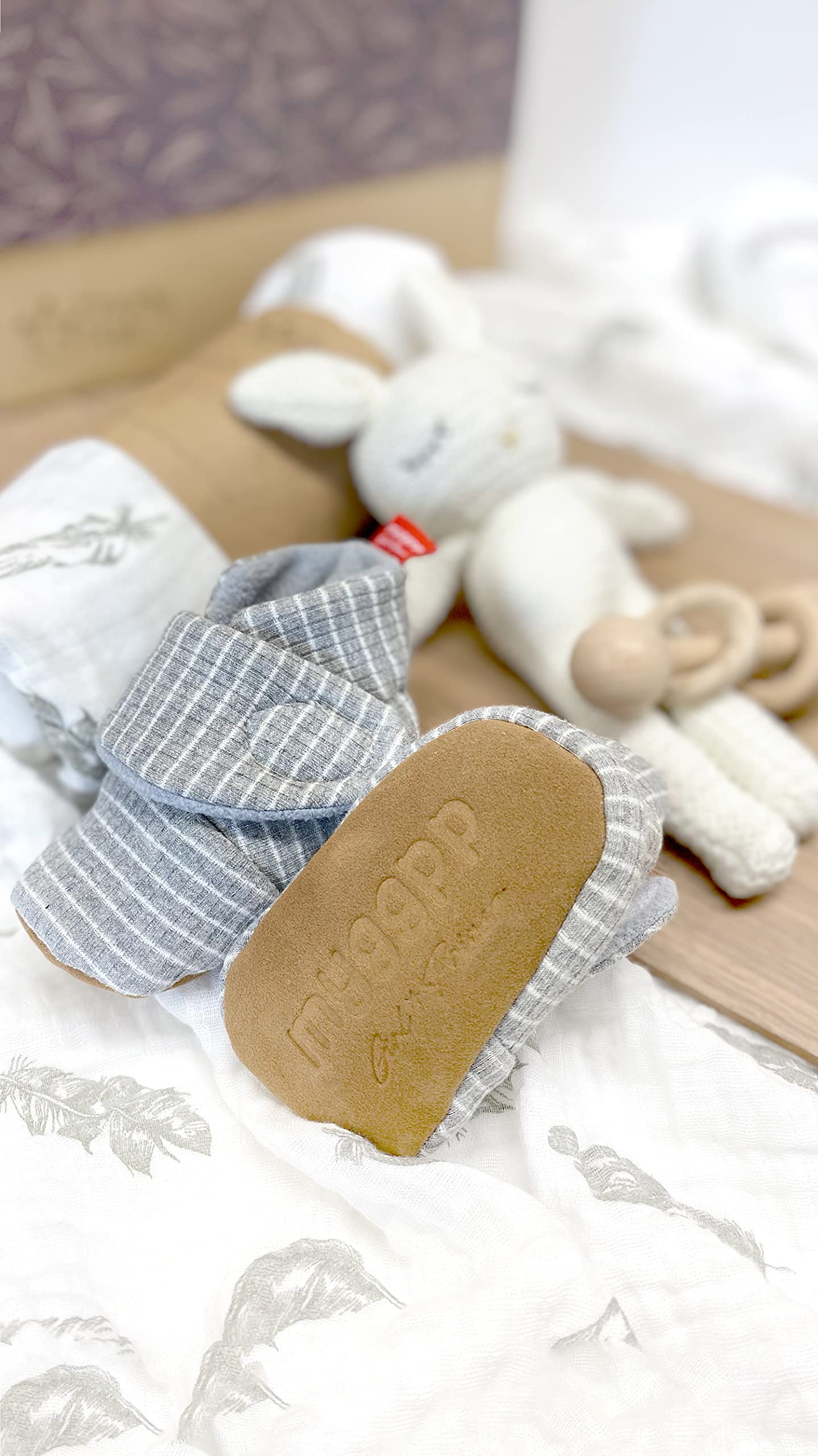 Moody Park organic cotton swaddle closeup emphasizes breathable fabric and cozy early days.