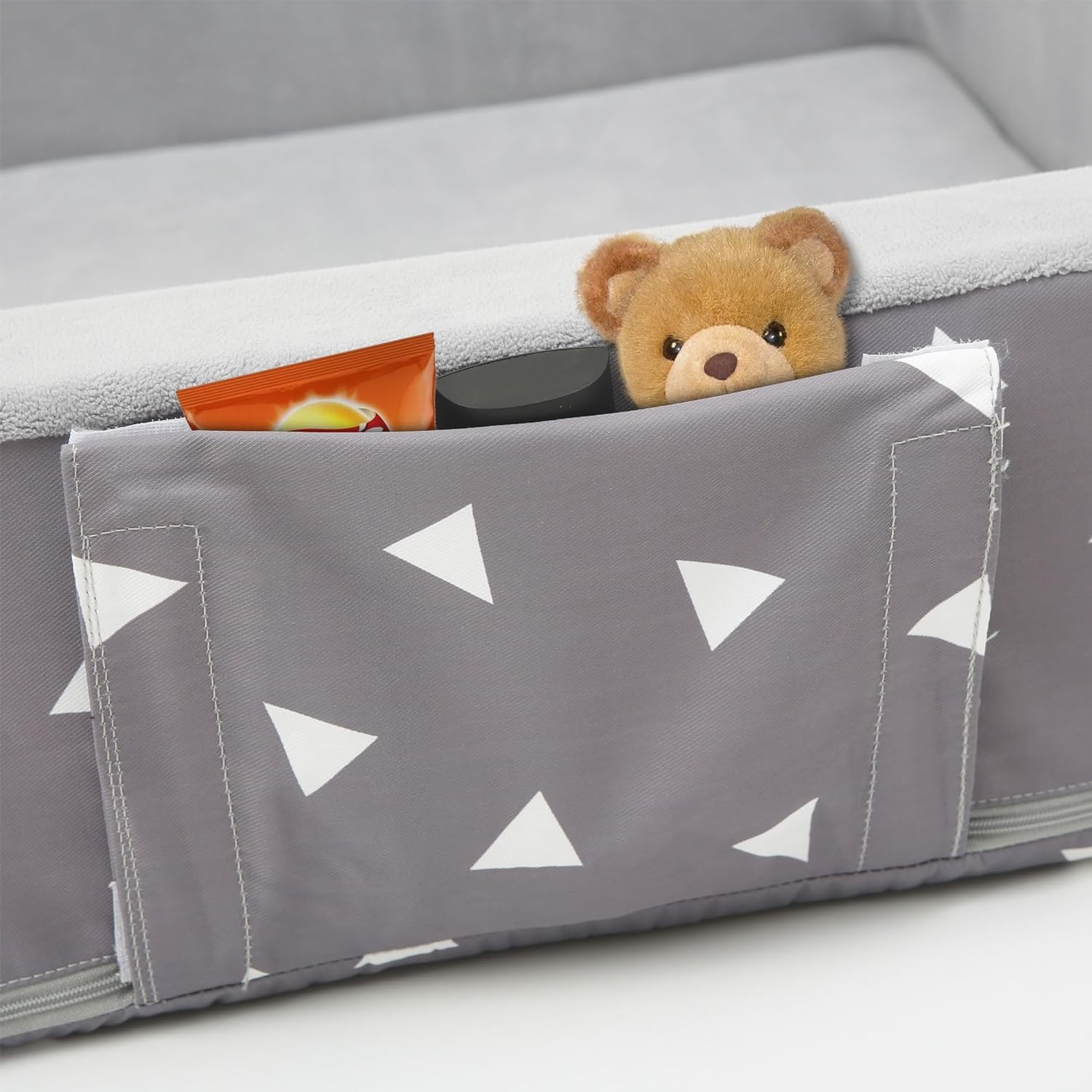 Mooedcoe toddler travel bed bumper height demonstrated for edge safety.
