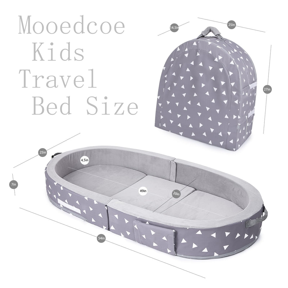 Mooedcoe toddler travel bed with sides to create a defined sleep zone.