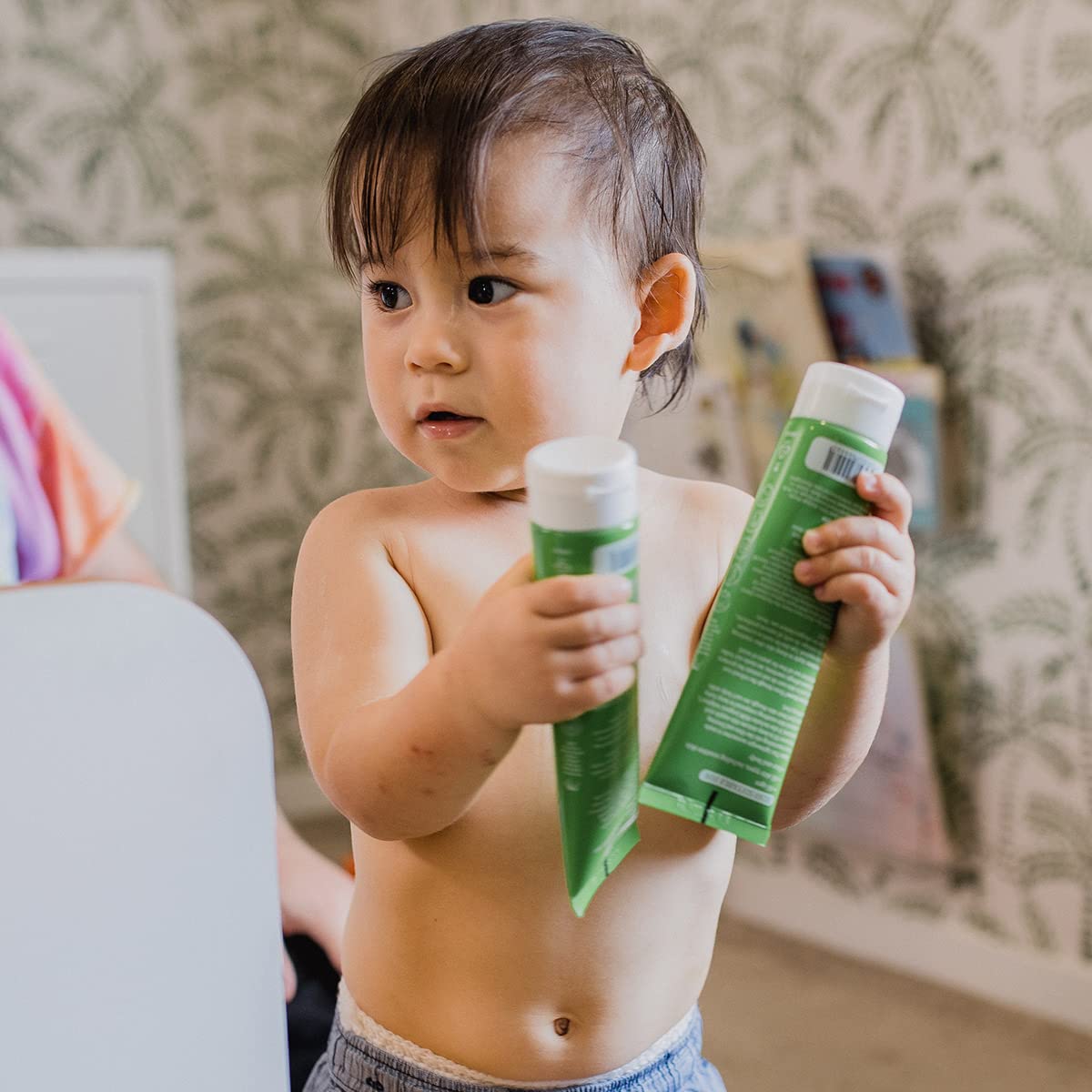 MooGoo Baby MSM 10% label closeup indicating calming, skin-supporting formula.