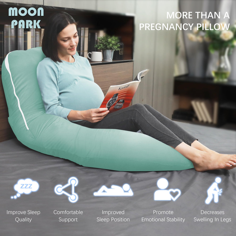 MOON PARK pillow in bed with user demonstrates full-body support for various sleeping positions.