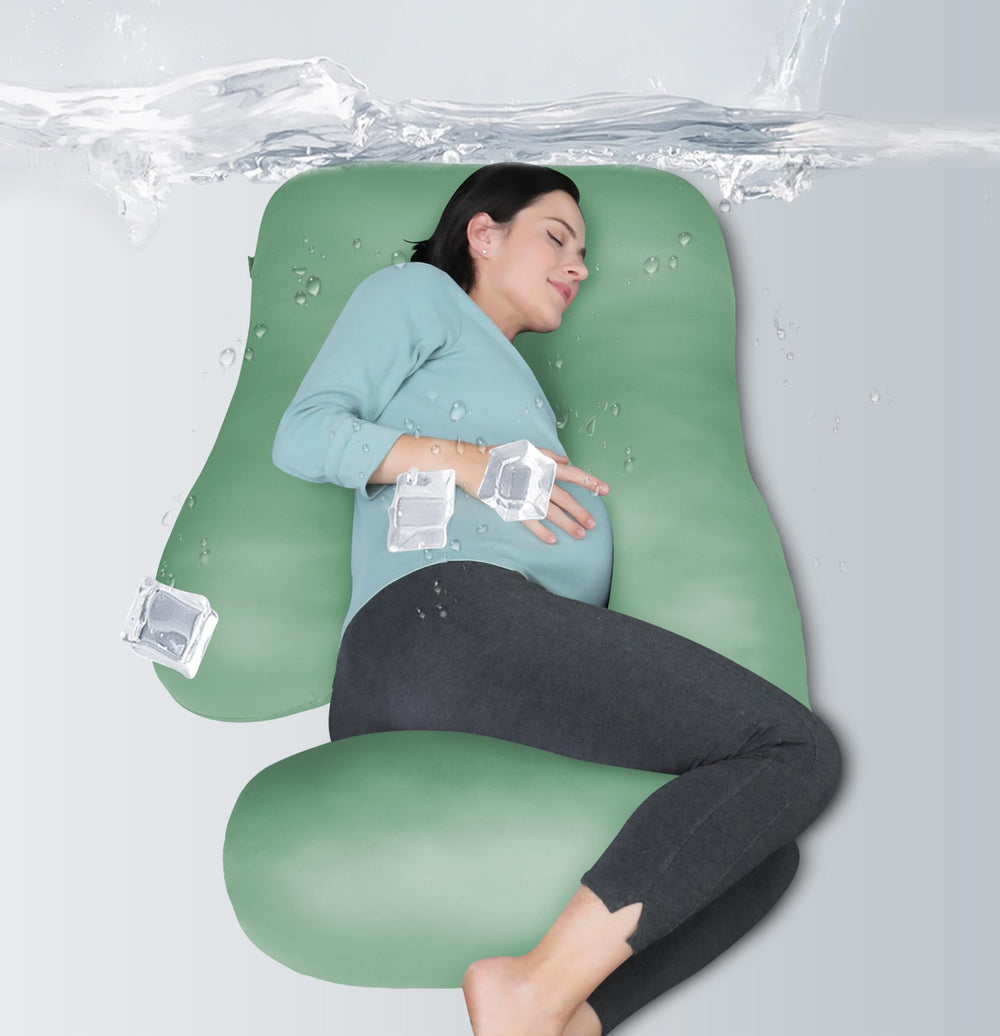 Moon Park full-body pregnancy pillow in green provides complete sleep support.