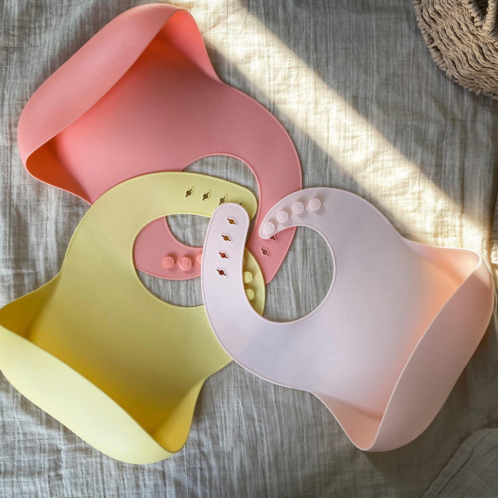 Moonkie silicone baby bibs set of 3 showcases color variety for family meals.