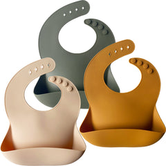 Moonkie silicone bibs cream close-up shows soft, skin-friendly material for comfortable meals.