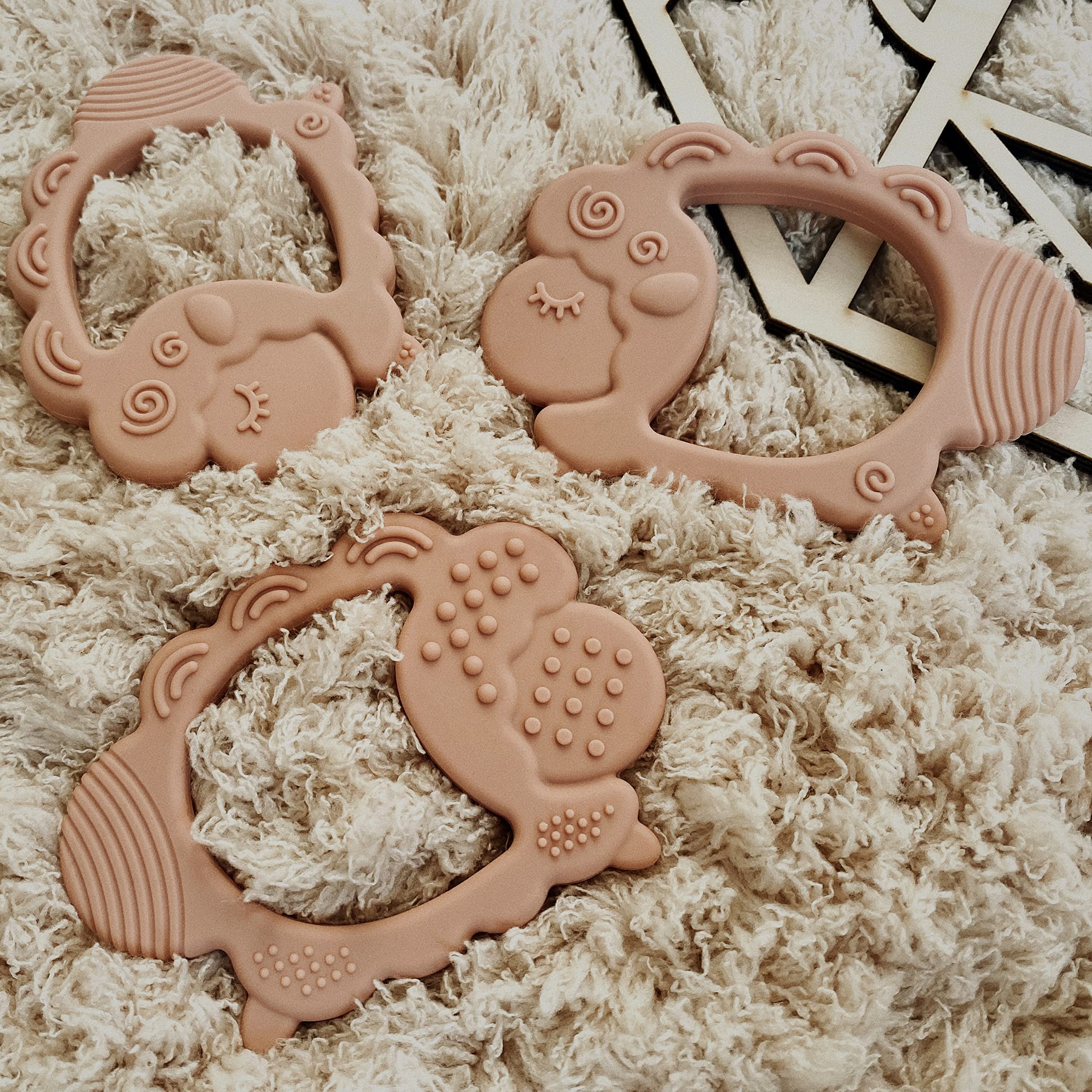 Moonkie lamb design zero choking hazard for safer teething sessions.
