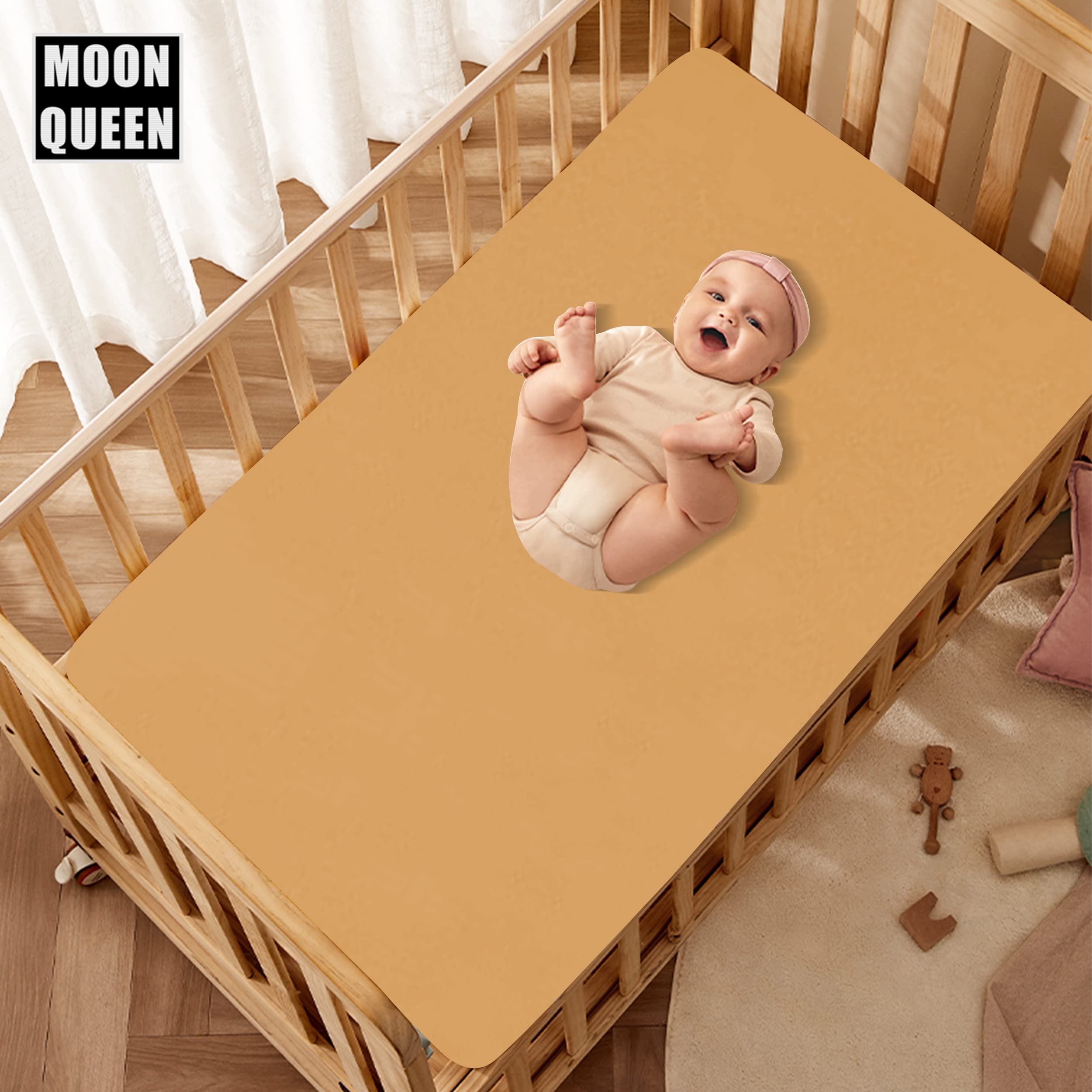 MOONQUEEN crib sheet pocket design ensuring secure mattress coverage.