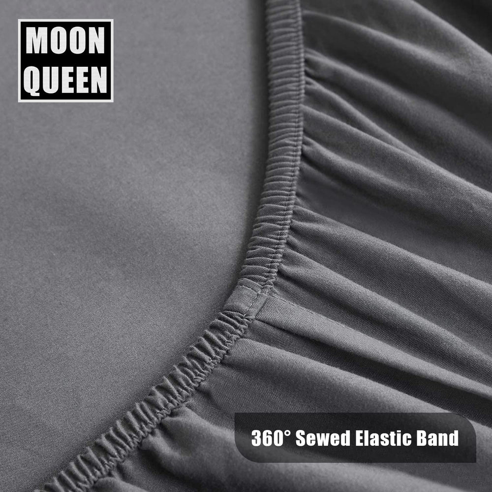 Moonqueen crib sheet displayed on a standard 28x52x8 inch crib mattress.