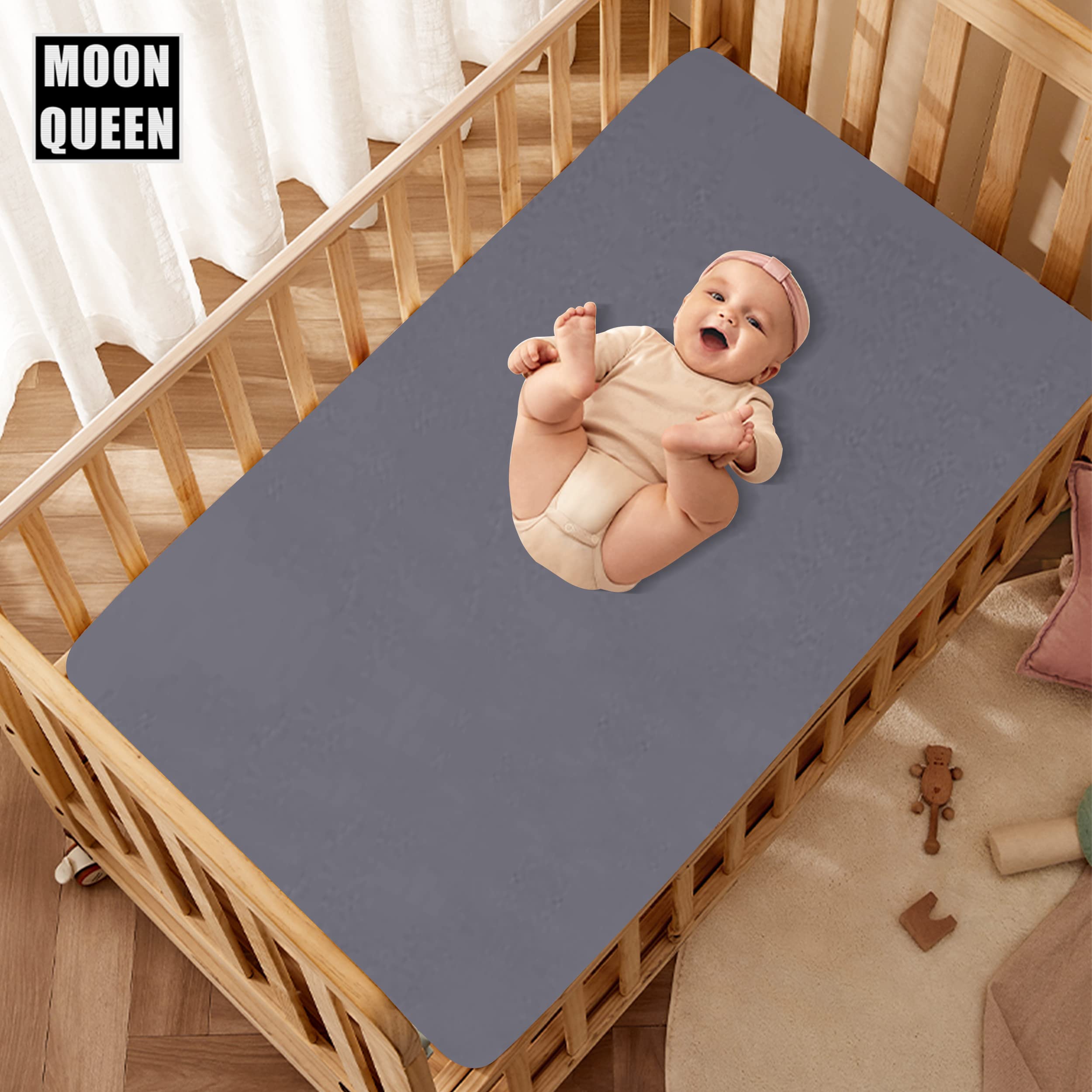 Moonqueen fitted sheet with pocket design showing snug fit on mattresses up to eight inches.