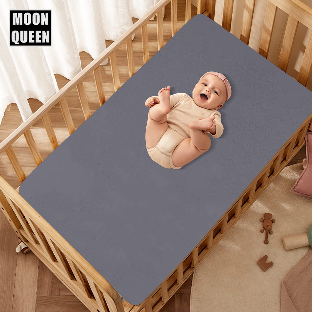 Moonqueen fitted sheet with pocket design showing snug fit on mattresses up to eight inches.