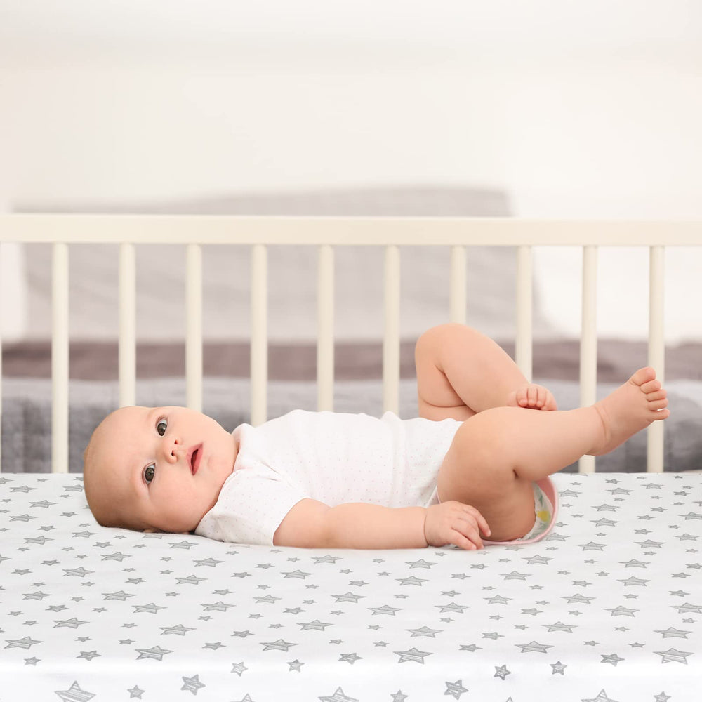 Moonsea Halo bassinet sheet noiseless bottom layer prevents crinkling for peaceful sleep.