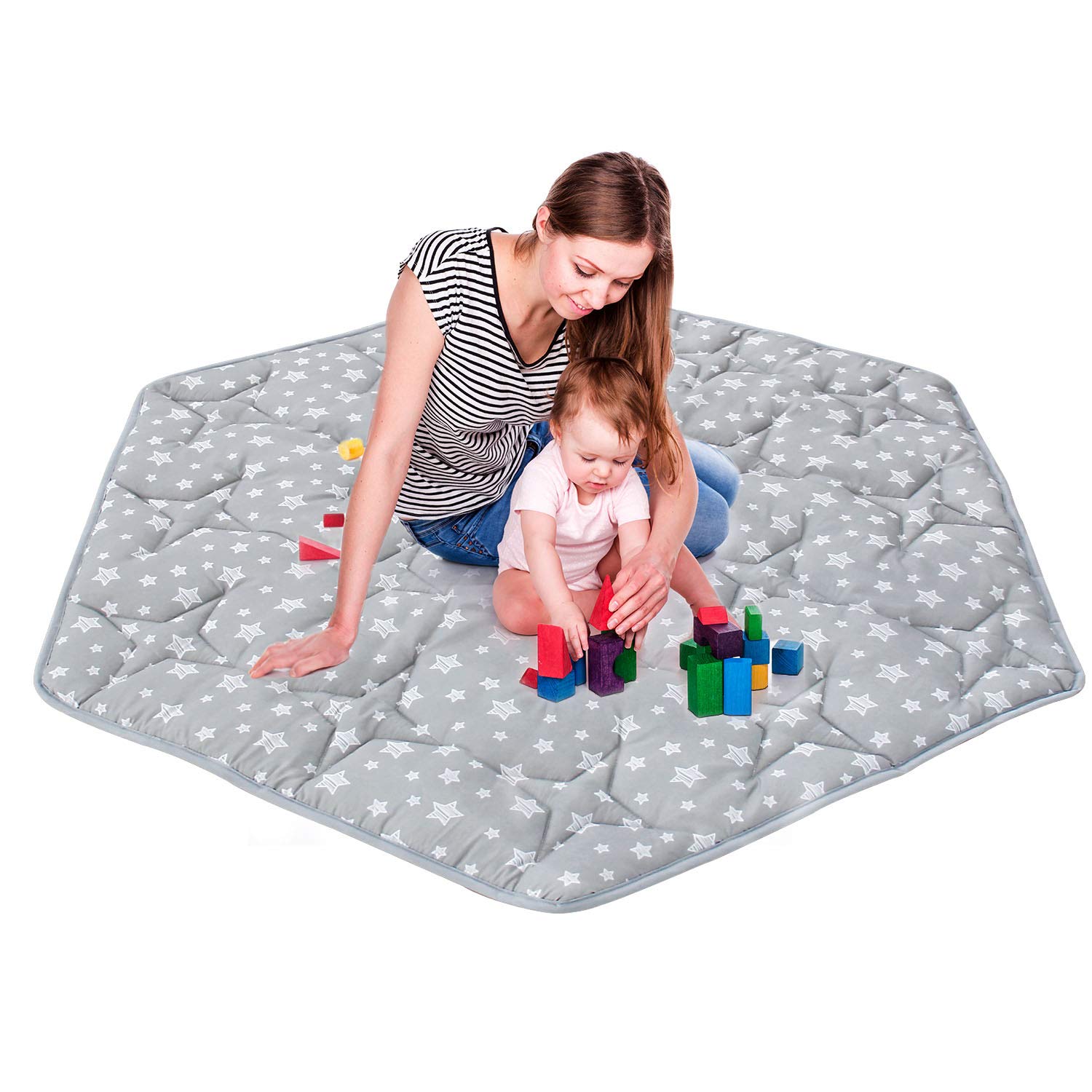 Moonsea hexagon playpen mat in living room, creates safe play surface for babies