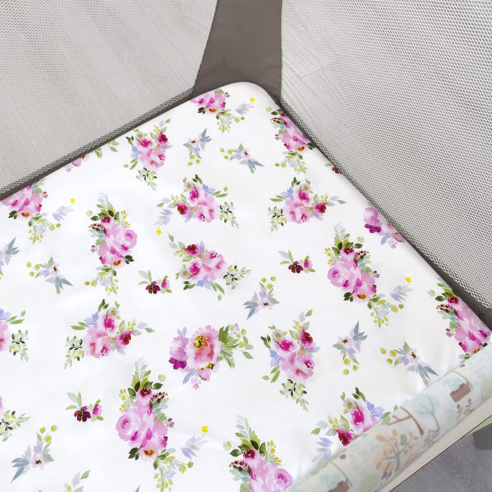 Moonsea Pack and Play Sheets floral pattern on playard showing Graco compatibility