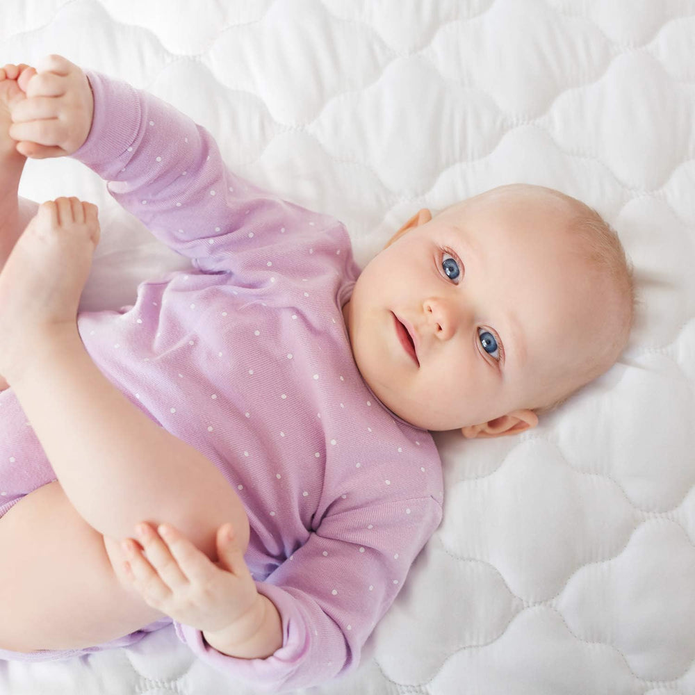 Moonsea protective backing provides extra coverage on mini crib mattress