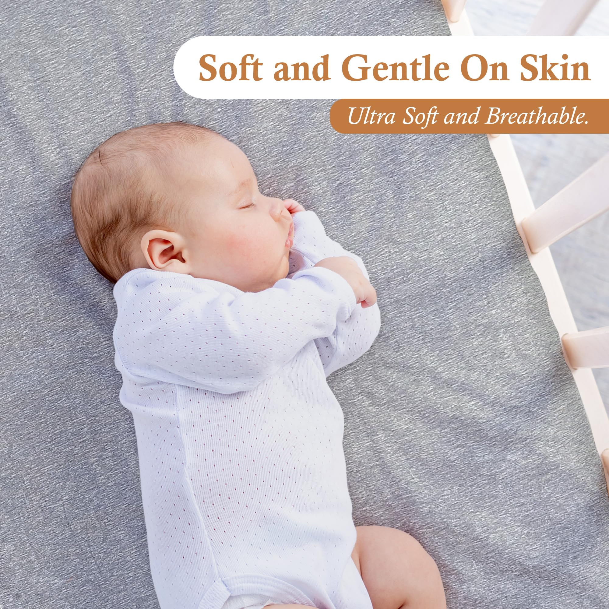 Flat view shows 28x52 size, suitable for standard crib mattresses.