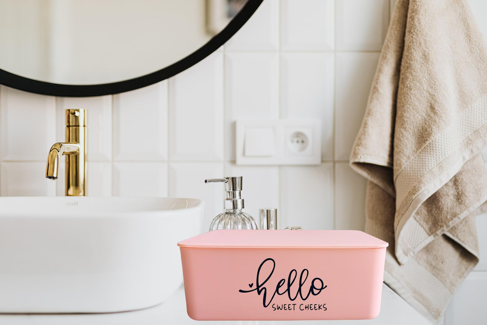 Moorfowl Hello Sweet Cheeks Wipes Holder pink in nursery bathroom.