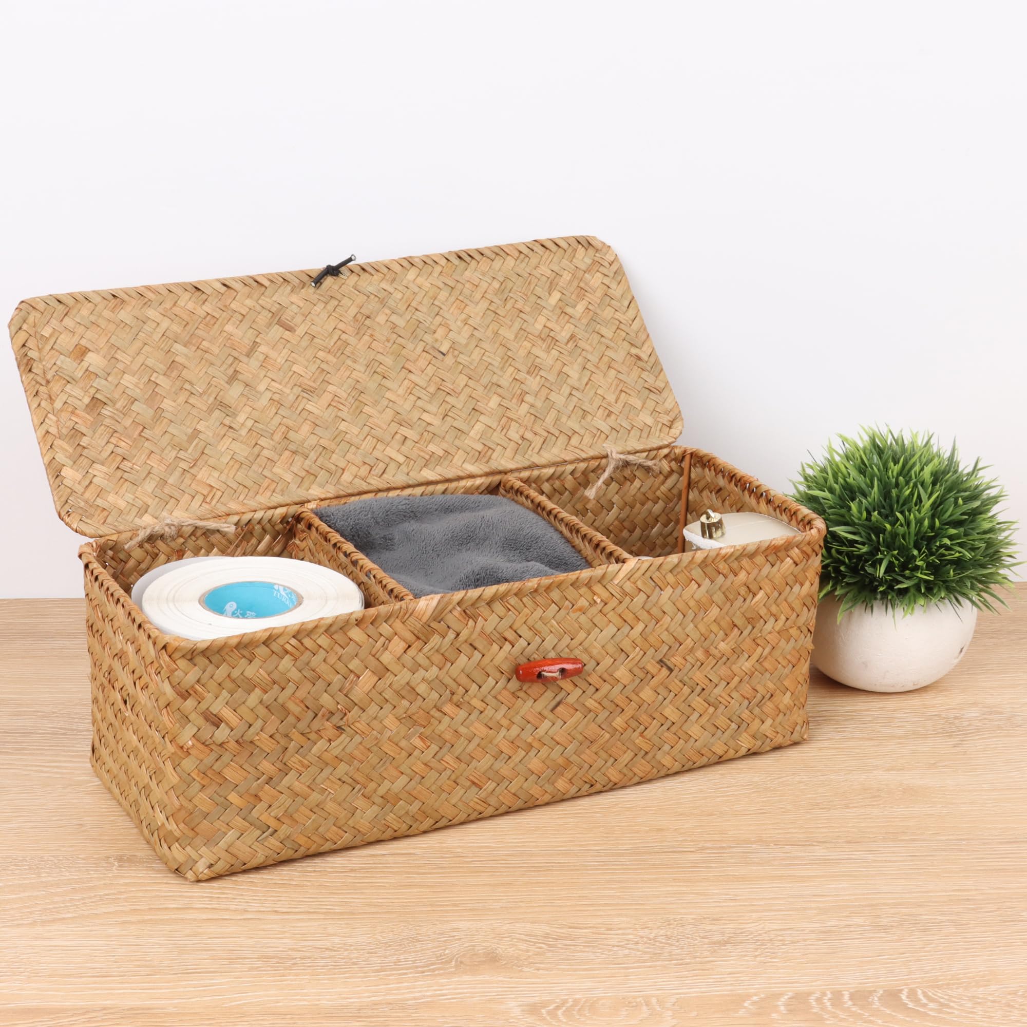 Moosky wicker shelf baskets lid buckled to help keep dust out and secure small items.