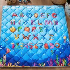 MORAIS Ocean animals close-up on mat enhances sensory exploration.
