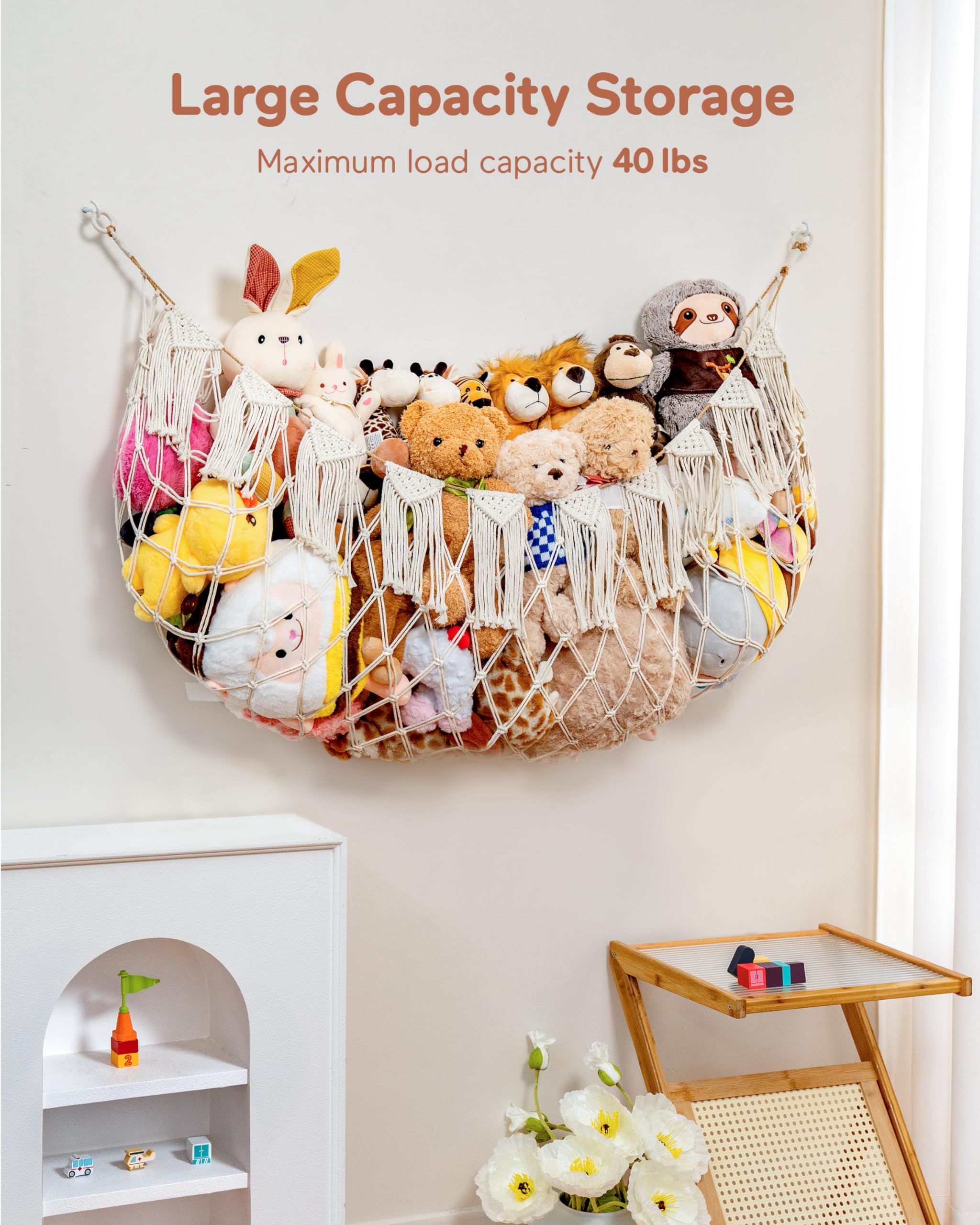 MORCCO boho macrame toy hammock shown in white tassels for nursery decor.
