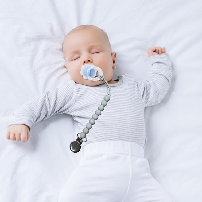 MORIBOX pacifier clip closeup shows BPA-free materials for safe, clean pacifier access.
