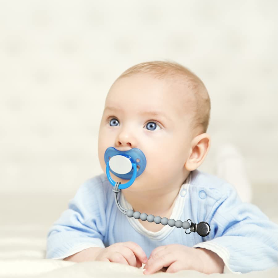 MORIBOX pacifier clip attached to baby bottle for secure mess-free use