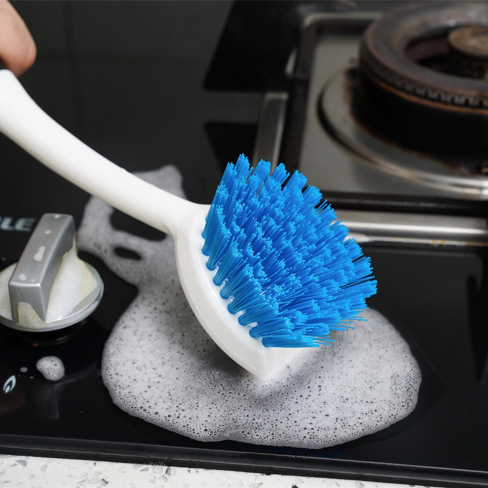 MOSOLAN pot and pan scrub brush tackles stubborn grime.