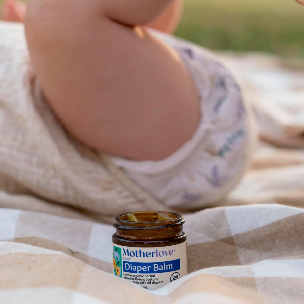 Application on diaper area demonstrating gentle touch with Motherlove Diaper Balm.