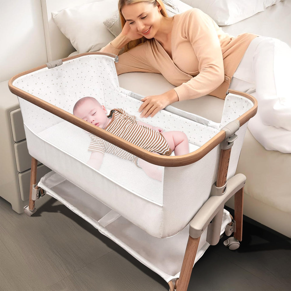 Motherly Haven bassinet with breathable mesh panel promotes airflow and safe sleep.