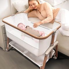 Motherly Haven bassinet with breathable mesh panel promotes airflow and safe sleep.