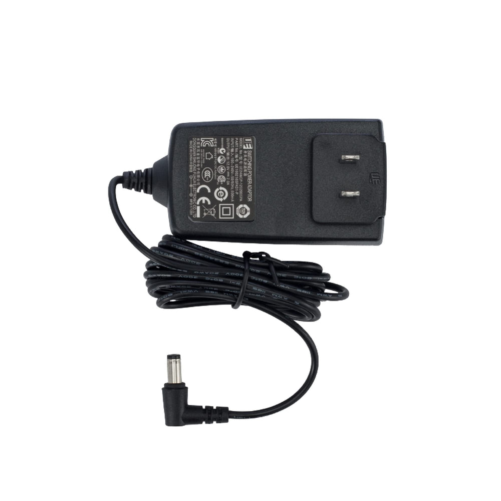 Motif Medical 12V power adapter connects to Luna pump for reliable travel charging.