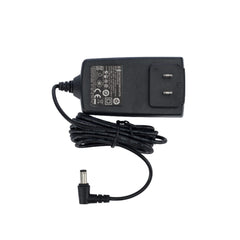 Motif Medical 12V power adapter connects to Luna pump for reliable travel charging.