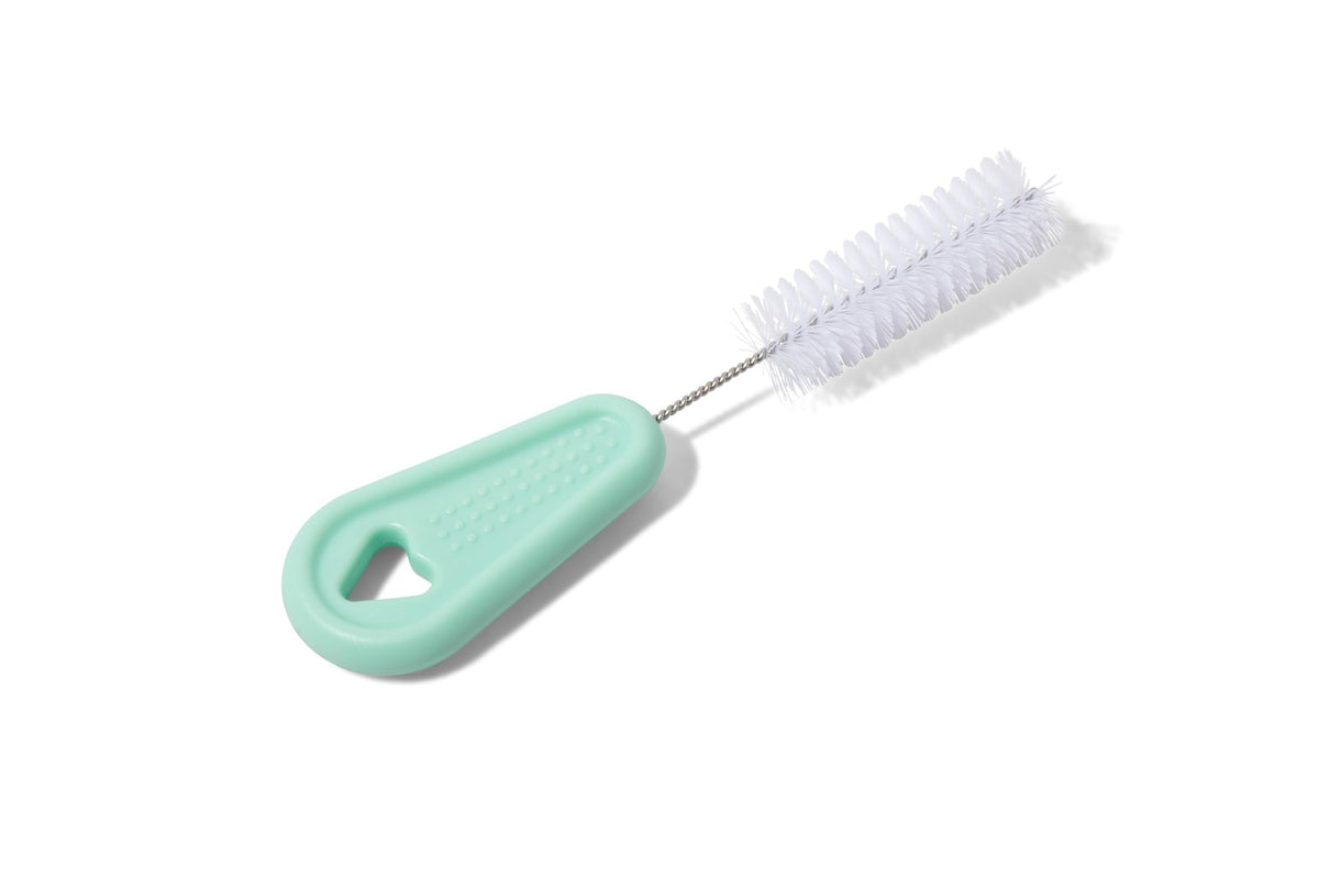 Motif Medical Aura Glow cleaning brush keeps pump parts hygienic for quick nighttime pumping