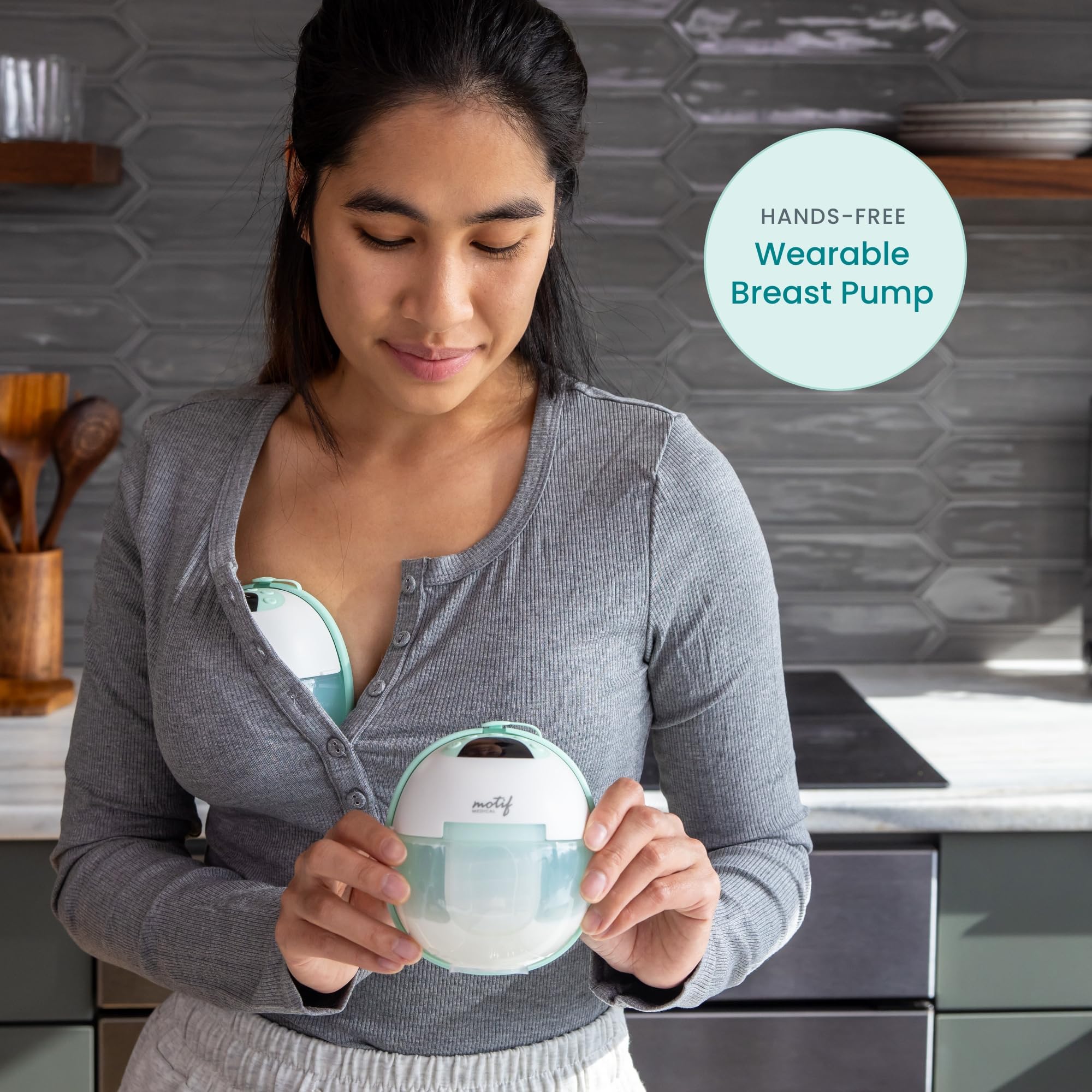Motif Medical Aura Glow nightlight illuminates a nighttime pumping session.